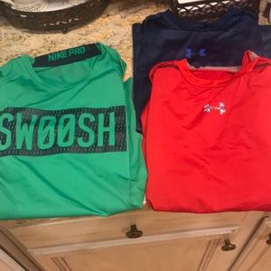 Three boys fitted athletic shirts